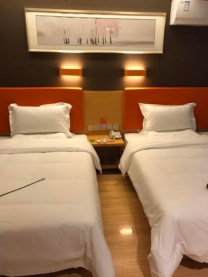 7 Days Premium Chongqing Jiangbei International Airport Branch Hotel Buitenkant foto